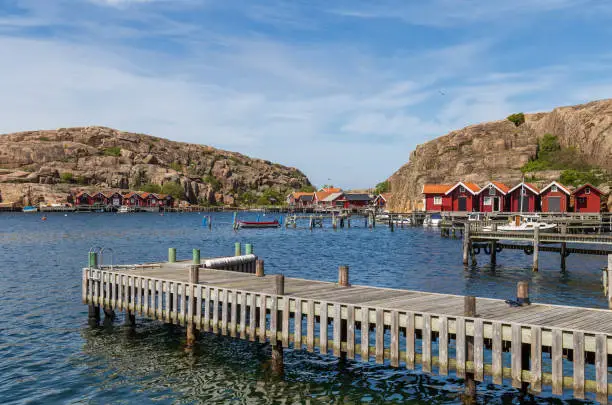 Photo of Red boathouses on the island Hamburgö; a small fishing port in the archipelago on the west coast of Bohuslän, Sweden
