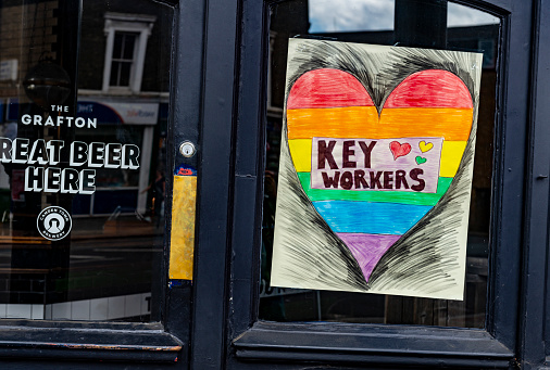 Heart sign for Covid-19 keyworkers on a pub door in Camden, North London, UK.