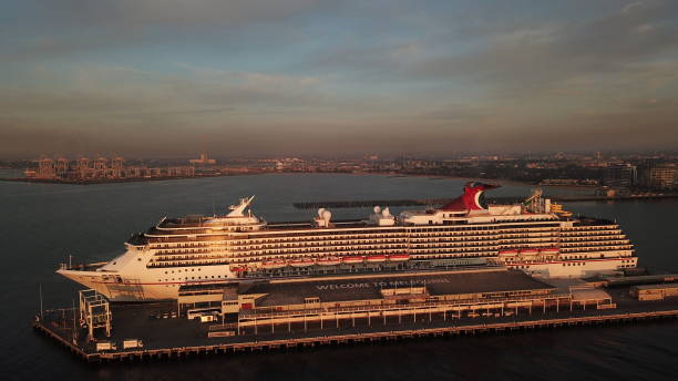 Ship on the sea Melbourne, Australia - February 6th 2019. Carnival Legend, a Spirit class cruise ship operated by Carnival Cruise Line, docked at Port Melbourne. port melbourne melbourne stock pictures, royalty-free photos & images