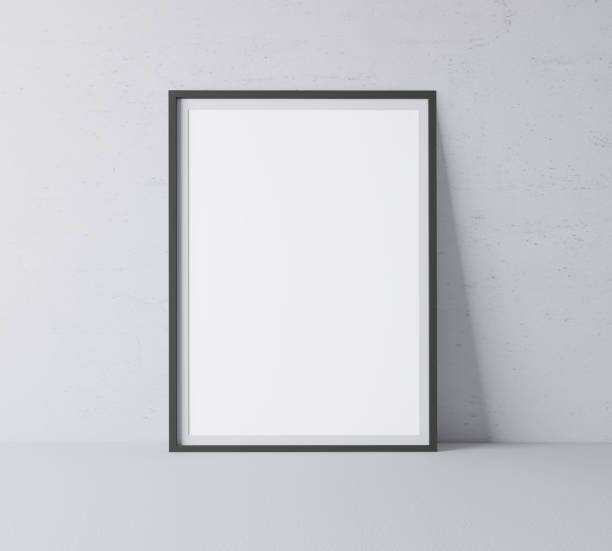 istock Black frame mock up. Frame poster standing on gray floor. Stock photo 1227360912