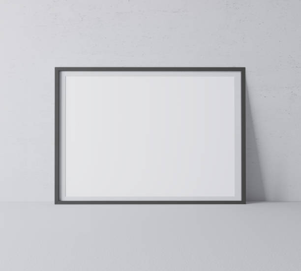 istock Black frame mock up. Frame poster standing on gray floor. Stock photo 1227360977