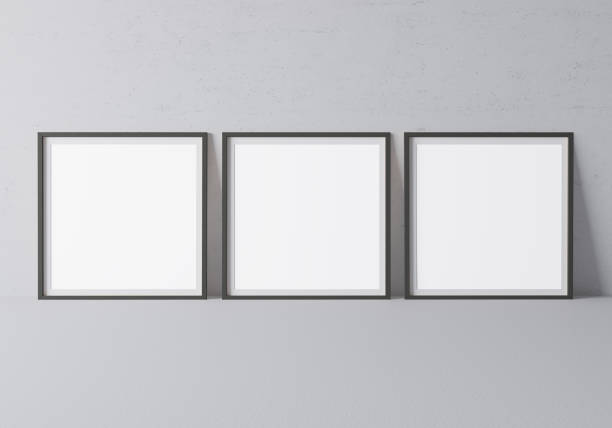 istock Black frame mock up. Frame poster standing on gray floor. Stock photo 1227361089