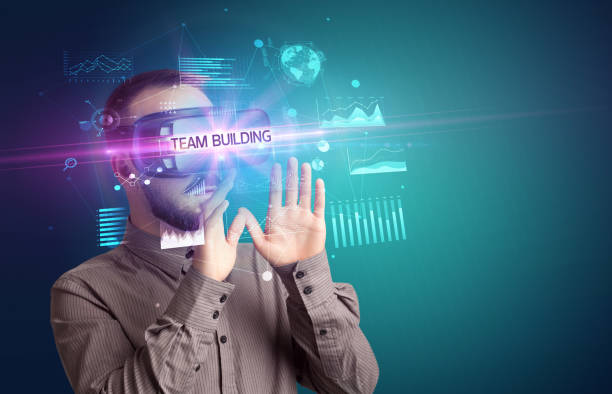 istock Businessman looking through Virtual Reality glasses 1227362441