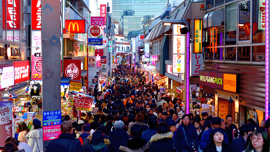 Tokyo, Japan-Jan. 2, 2018:(Takeshita-dori fully packed with crowd before COVID-19 Pandemic)\nTakeshita Street in Harajuku is one of the busiest streets in Tokyo with many young people, both Japanese and overseas visitors, under normal circumstances. Here are photos taken under the normal circumstances, when Takeshita-dori (street) is fully packed with crowd.