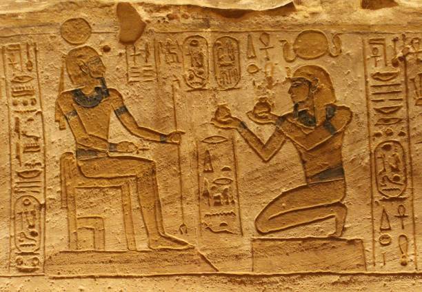 istock Abou Simbel interior wall cravings in Aswan showing offering rituals 1227363696