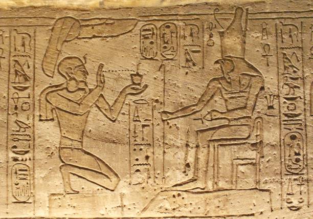istock Abou Simbel interior wall cravings in Aswan showing offering rituals 1227363734