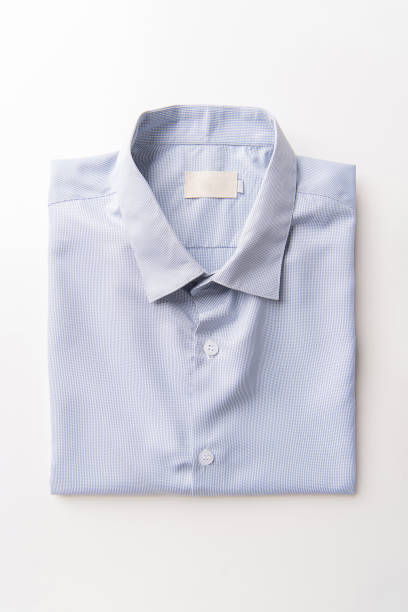 istock New White Men's shirts Folded on white background, 1227363949