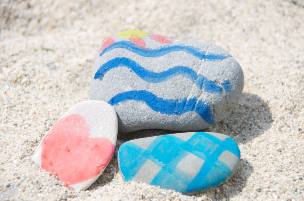 istock Coloured stones on the sand 1227369020