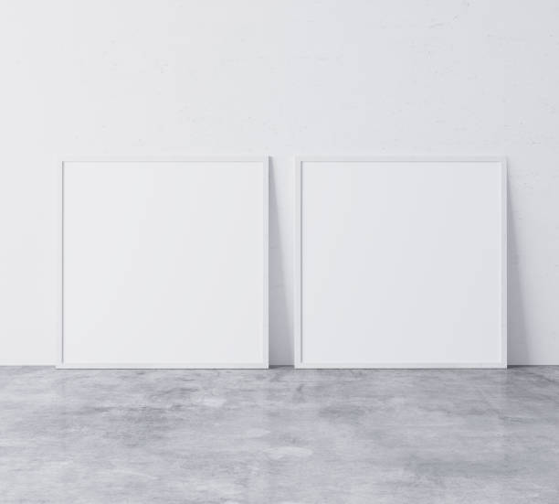 istock Two modern square frames mock up standing on concrete floor. Stock photo 1227369829