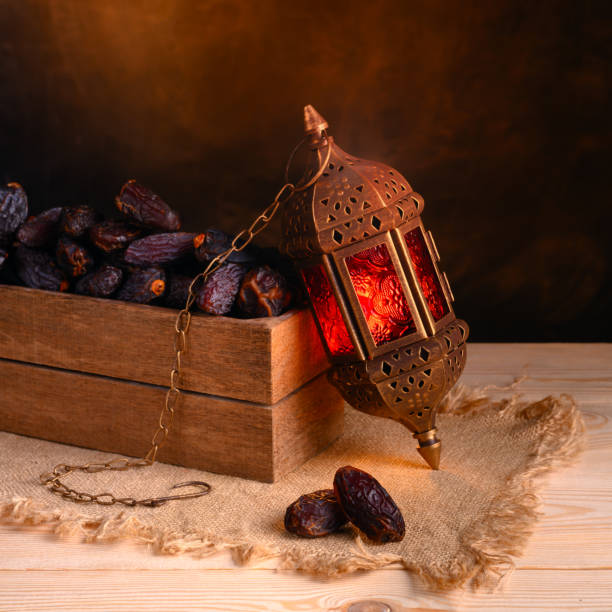 istock Ramadan concept. Dates close-up in the foreground. 1227370490