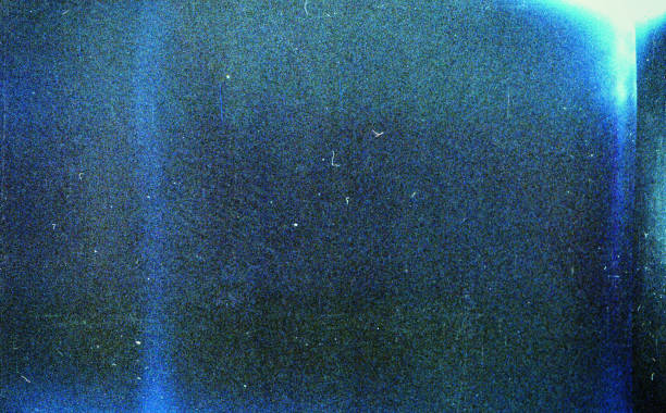istock Noisy blue film frame with scratches, dust and grain 1227372366