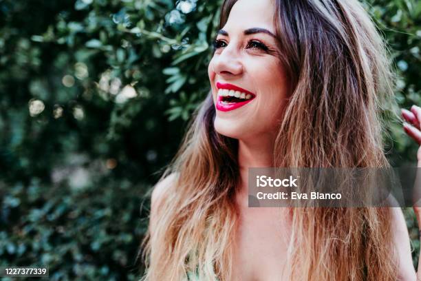 Portrait Of Beautiful Blonde Young Woman Smiling At Sunset Red Lips And Gorgeous Smile Happiness Concept Stock Photo - Download Image Now