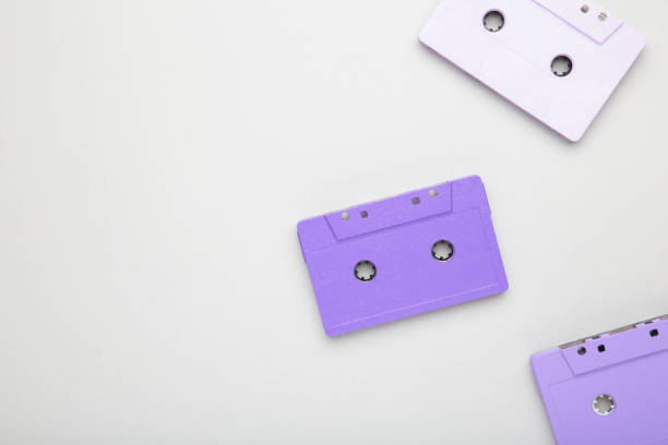 istock Old colorful cassettes on a grey background. Music day 1227379216