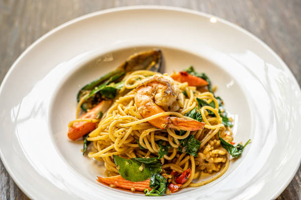 istock Close up Stir Fried Spaghetti with Shrimp With spaghetti noodles Put on the table in a European restaurant 1227384166