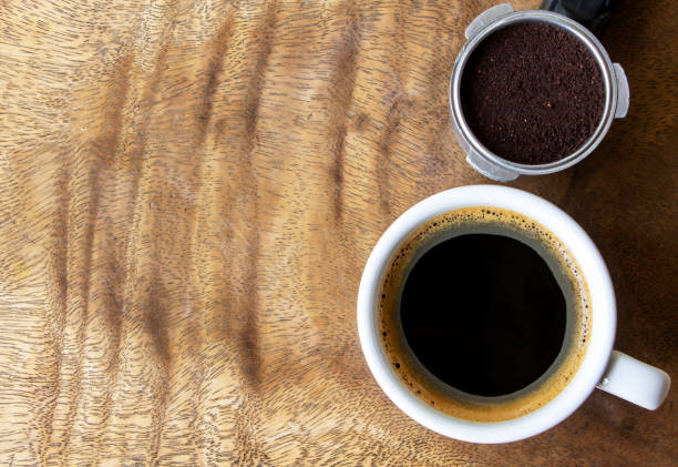 istock Cup of coffee and ground coffee. 1227389678