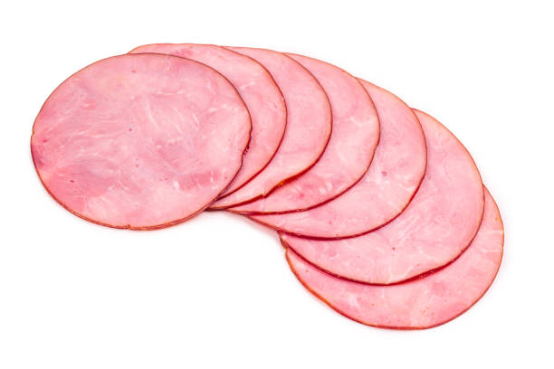 istock Sliced tasty ham background. 1227392703