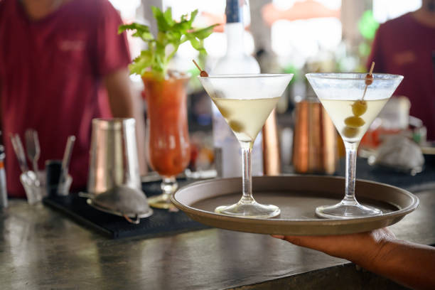 istock Waitress carrying dry martinis 1227392912