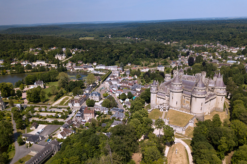 Pierrefonds, France - May 26 2020: The Pierrefonds Castle is an imposing castle located in the Oise department, in the Hauts-de-France region, on the south-eastern edge of the Compiègne forest.