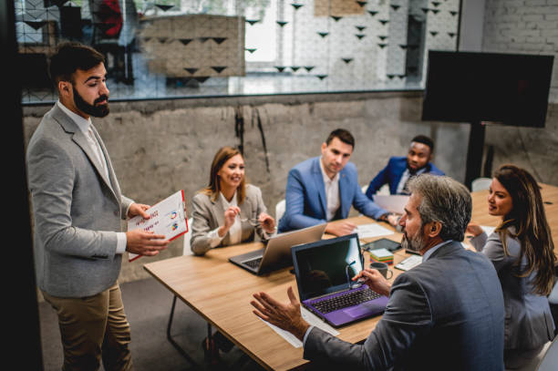 istock Business people discussing in board room 1227397785
