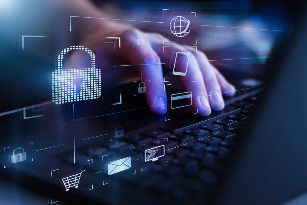 Data protection and secure online payments. Cyber internet security technologies and data encryption . Closeup view of man`s hand using laptop with virtual digital screen with icon of lock on it. stock photo