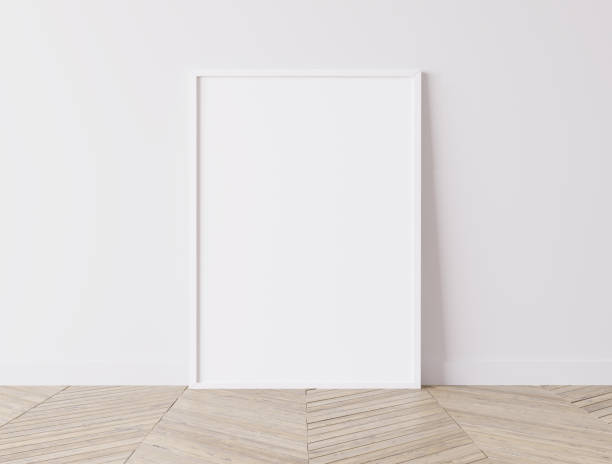 Vertical white  wooden frame, White Wall and stylish parquet floor. Design Template for Mock Up. Stock photo