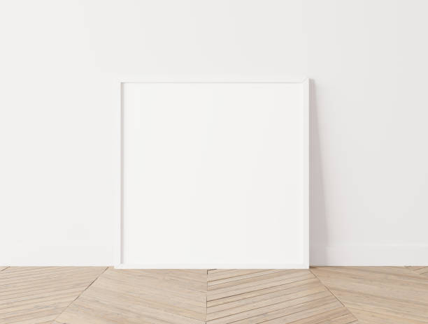 istock Modern white square frame Standing on parquet floor with white background, poster frame mock up interior. Stock photo 1227400878