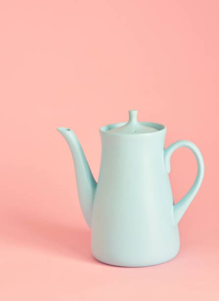 istock minimalism concept with light pastel colored blue teapot 1227400890