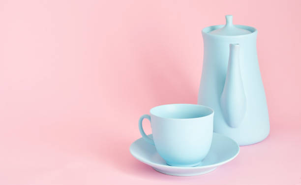 istock minimalism concept with light pastel colored blue teapot 1227400983