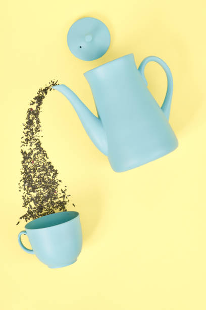 istock minimalism concept with light pastel colored blue teapot 1227401592