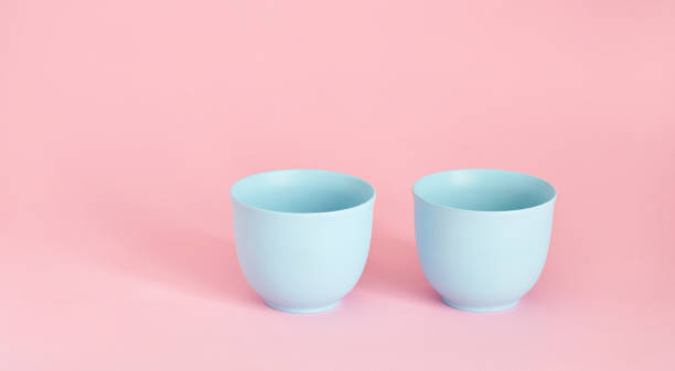 istock minimalism concept with light pastel colored blue cups 1227401642