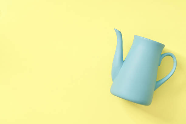 istock minimalism concept with light pastel colored blue teapot 1227401945