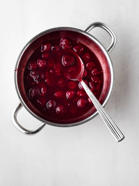 istock Cherry jam, Cherry Sauce, Sour cherries,Cherry jam with spoon 1227404719