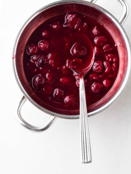 istock Cherry jam, Cherry Sauce, Sour cherries,Cherry jam with spoon 1227405051