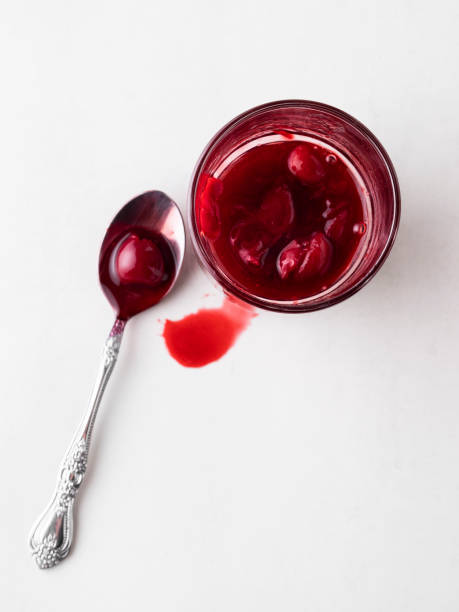 istock Cherry jam, Cherry Sauce, Sour cherries,Cherry jam with spoon 1227406432