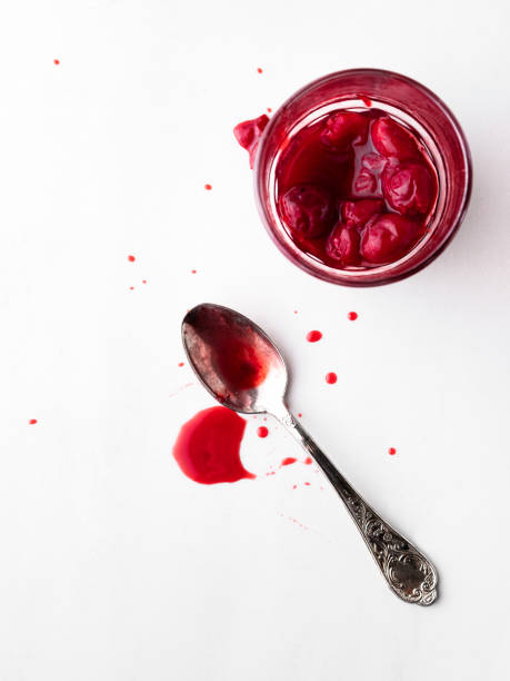 istock Cherry jam, Cherry Sauce, Sour cherries,Cherry jam with spoon 1227407642