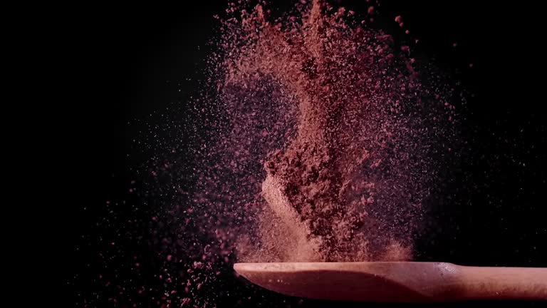 Ground Cinnamon on a Spoon in Super Slow Motion 1000 fps