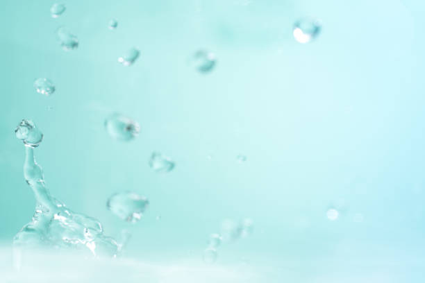istock Falling jets and drops of clear, clear blue water. 1227410136
