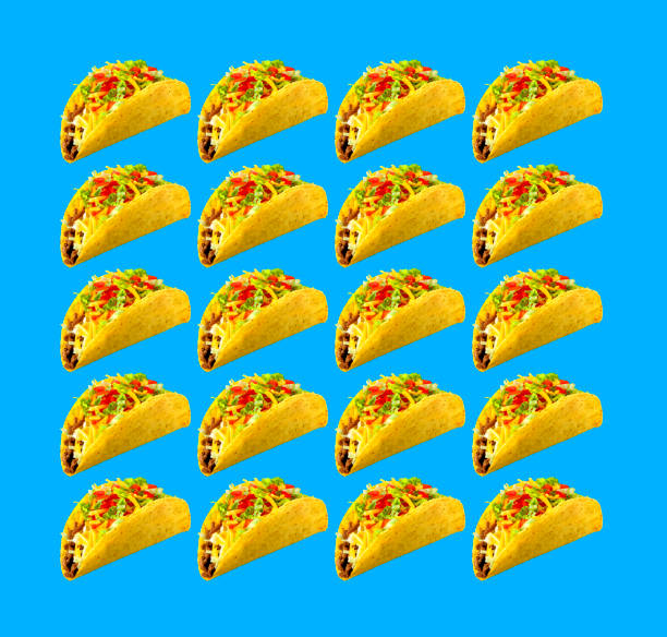 Rows Of Tacos On Blue Background Rows of tacos on a blue background taco photos stock pictures, royalty-free photos & images
