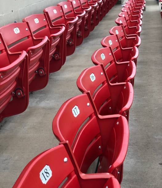 Empty stadium seating Seats at a local baseball stadium are empty during the coronavirus pandemic of 2020 baseball stadium chairs stock pictures, royalty-free photos & images