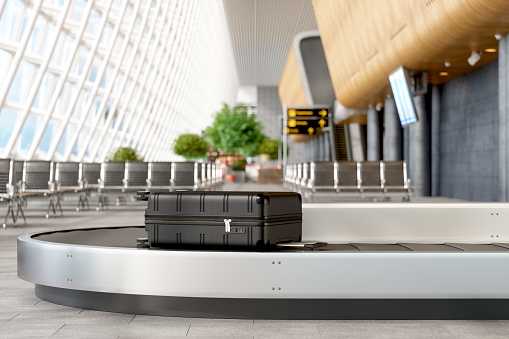 Luggages Moving On Airport Conveyor Belt  At Airport