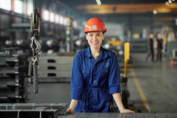 istock Smiling Asian metalworking specialist 1227413910
