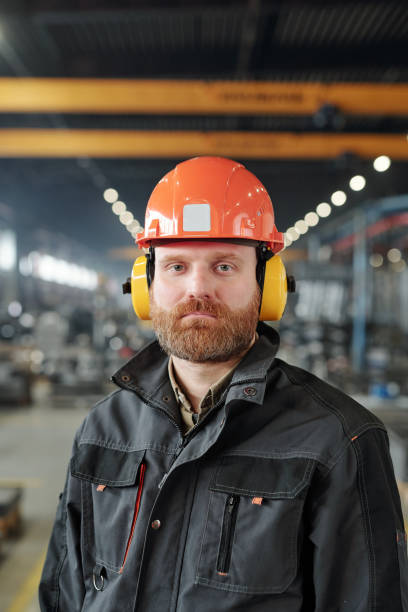 istock Portrait of serious man in work jacket 1227414457
