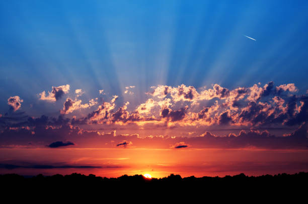 istock Early morning sunrise among the clouds 1227414852