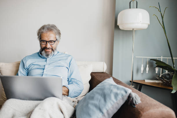 istock Mature man is working from home 1227414889