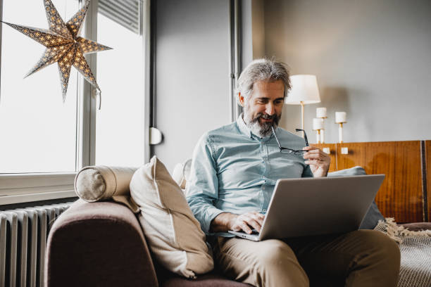 istock Mature man is working from home 1227414924