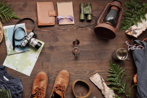istock Navigational compass among travelers stuff 1227415948