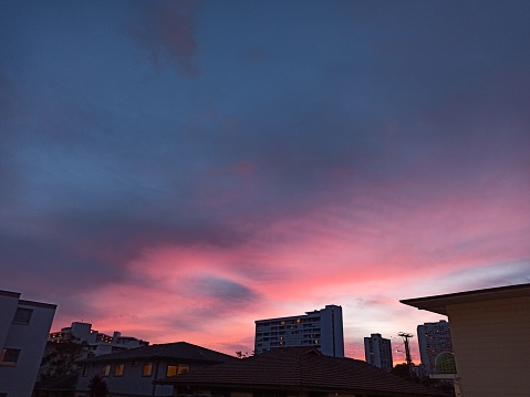 Summer sunset sky colors over Honolulu city Oahu island Hawaii