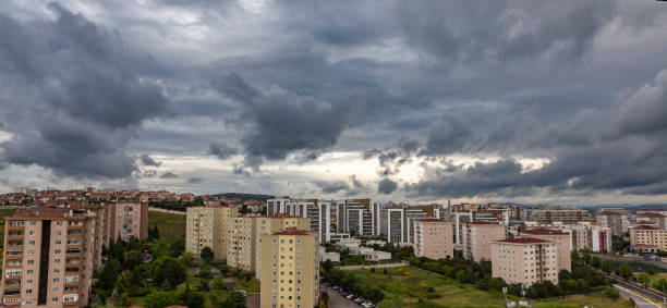 istock a city landscape with rain clouds 1227420510