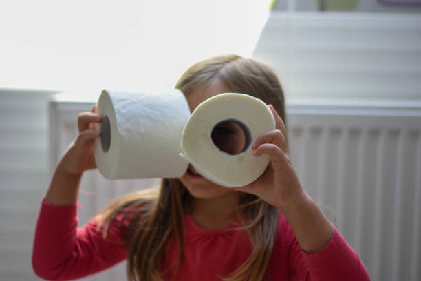 istock The child is playing with toilet paper 1227421837