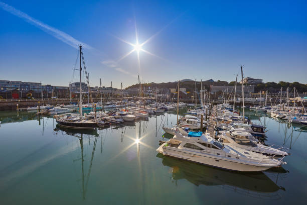 St Helier Marina Image of St Helier Marina North section from the West Marina wall, early morning with blue skys and sunshine. Jersey, Channel Islands, UK channel islands england stock pictures, royalty-free photos & images